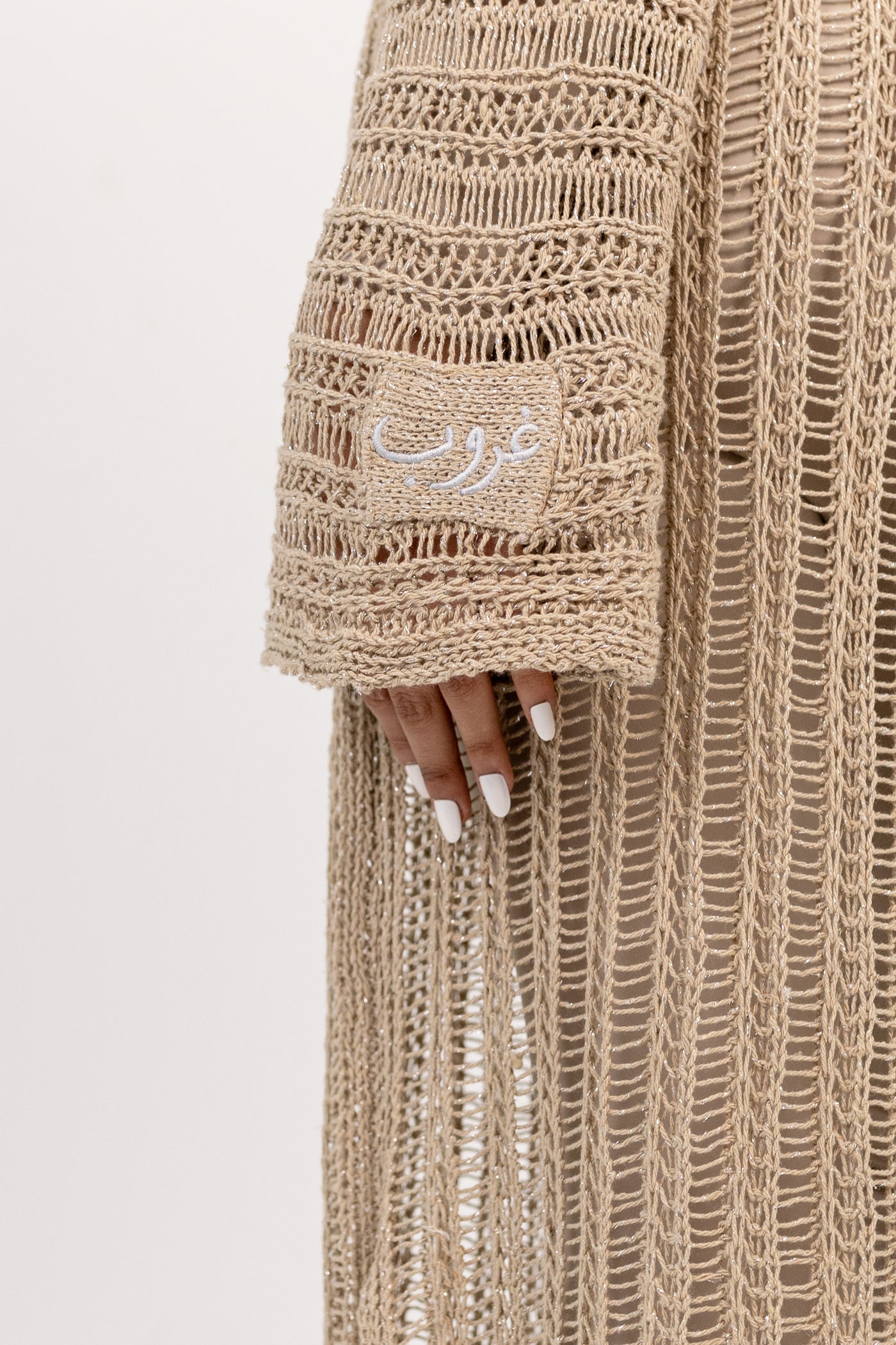 Ghoroub Cardigan in Dusk Beige · Silver, sleeve, patch and open-knit detail