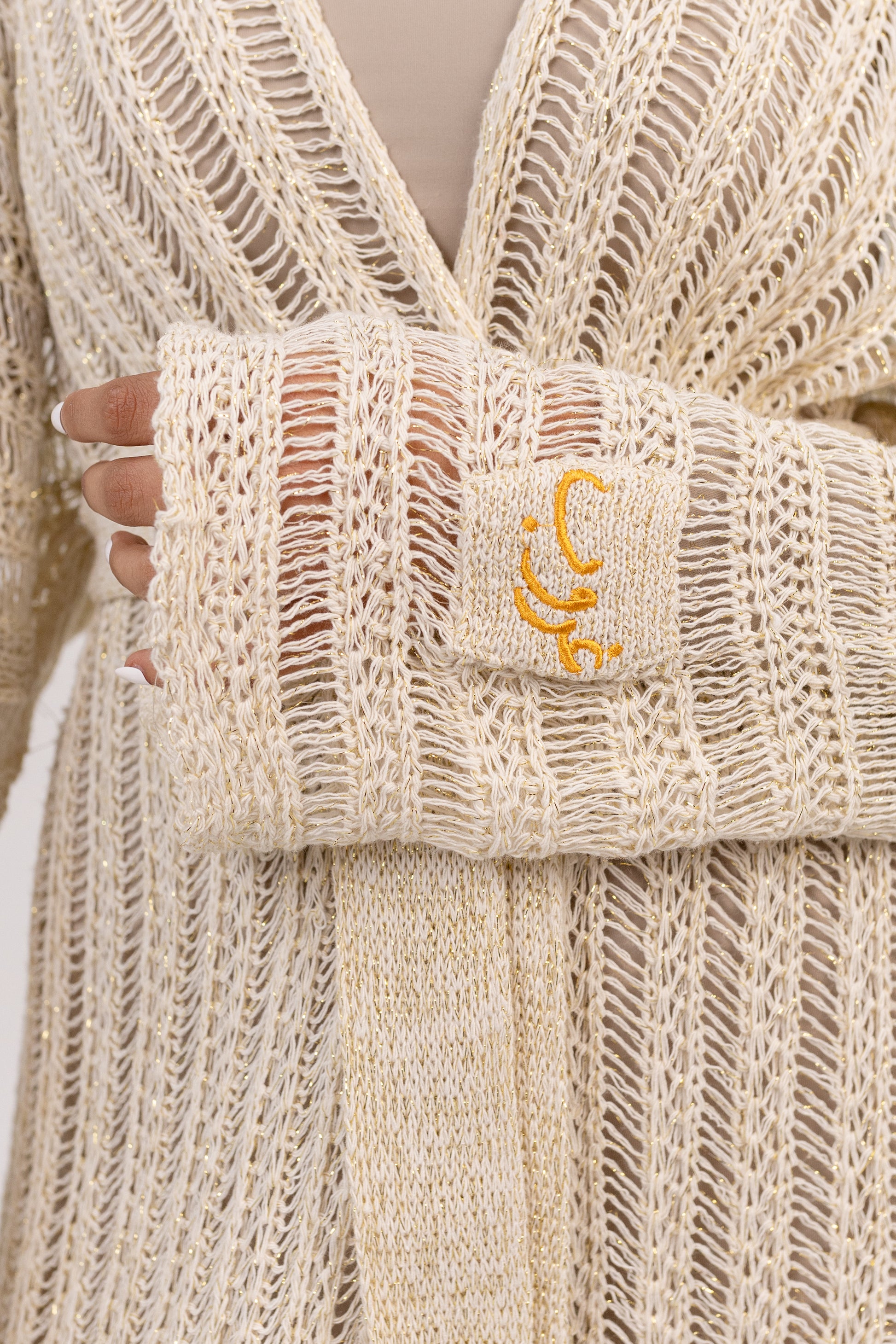 Ghoroub Coverup in Off-white with Gold, knit and Ghoroub embroidery detail