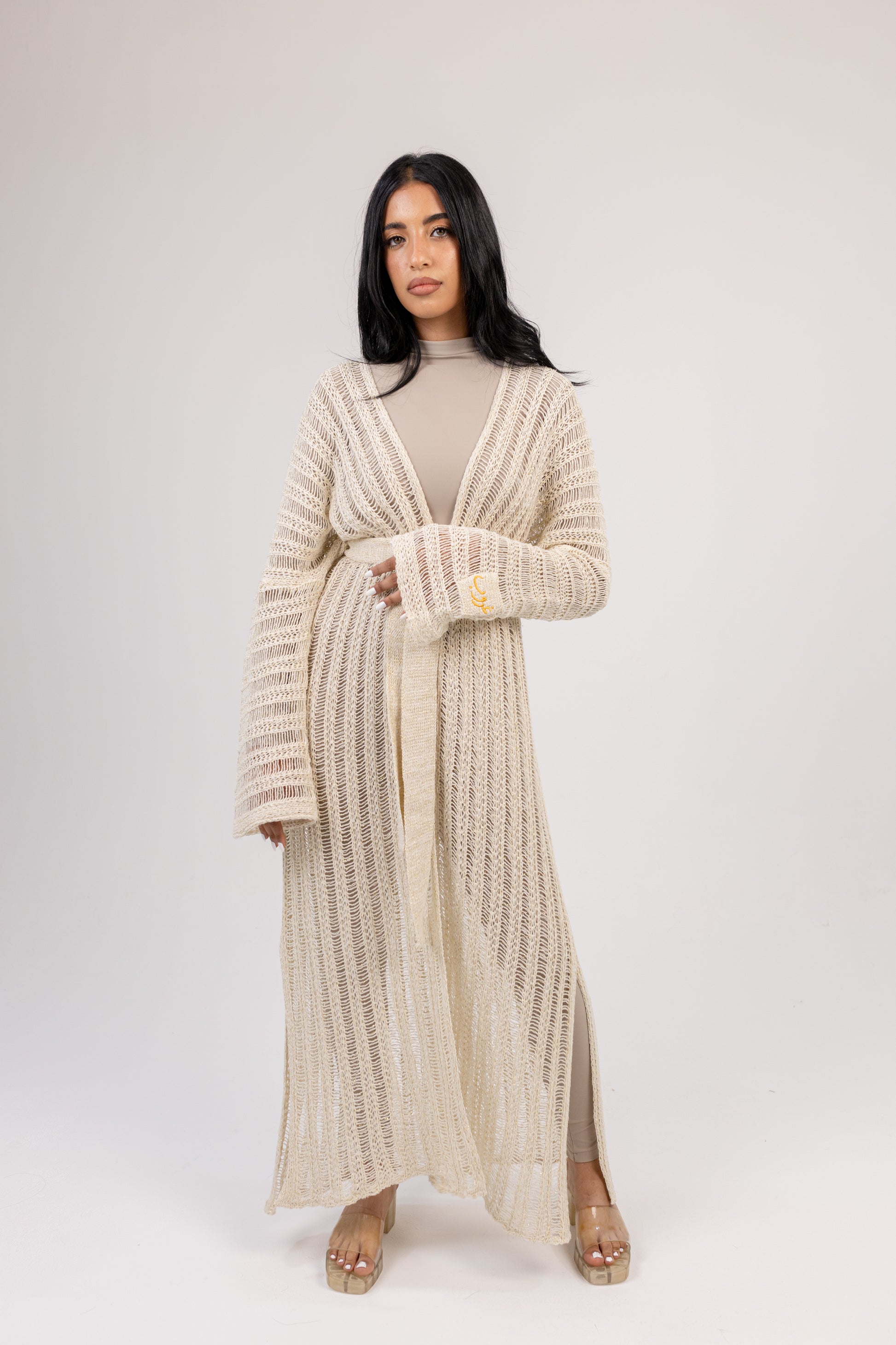 Ghoroub Coverup in Off-white with Gold, styled front view
