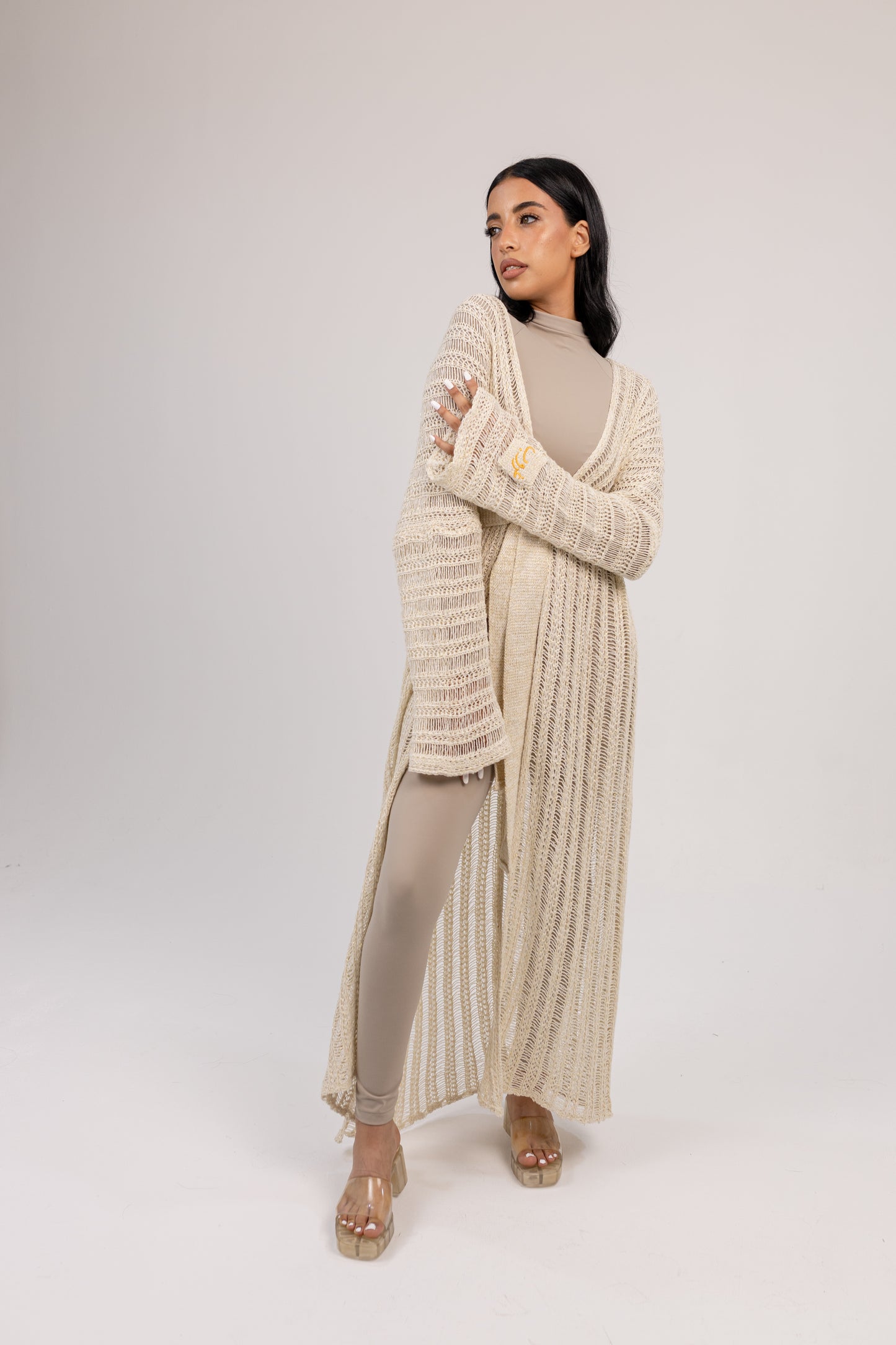 Ghoroub Coverup in Off-white with Gold, three-quarter full-length view