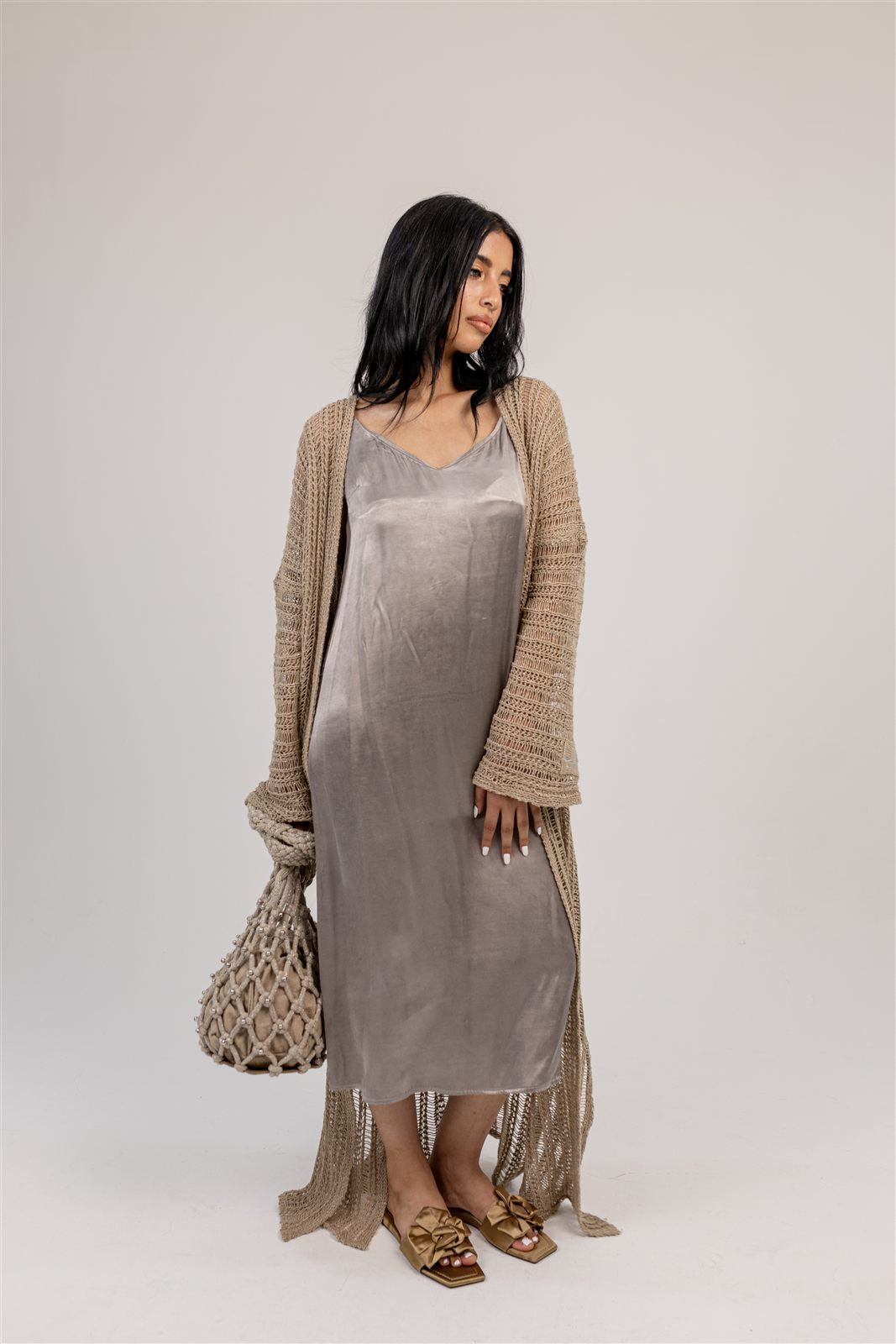 Ghoroub Cardigan worn over an evening slip dress.