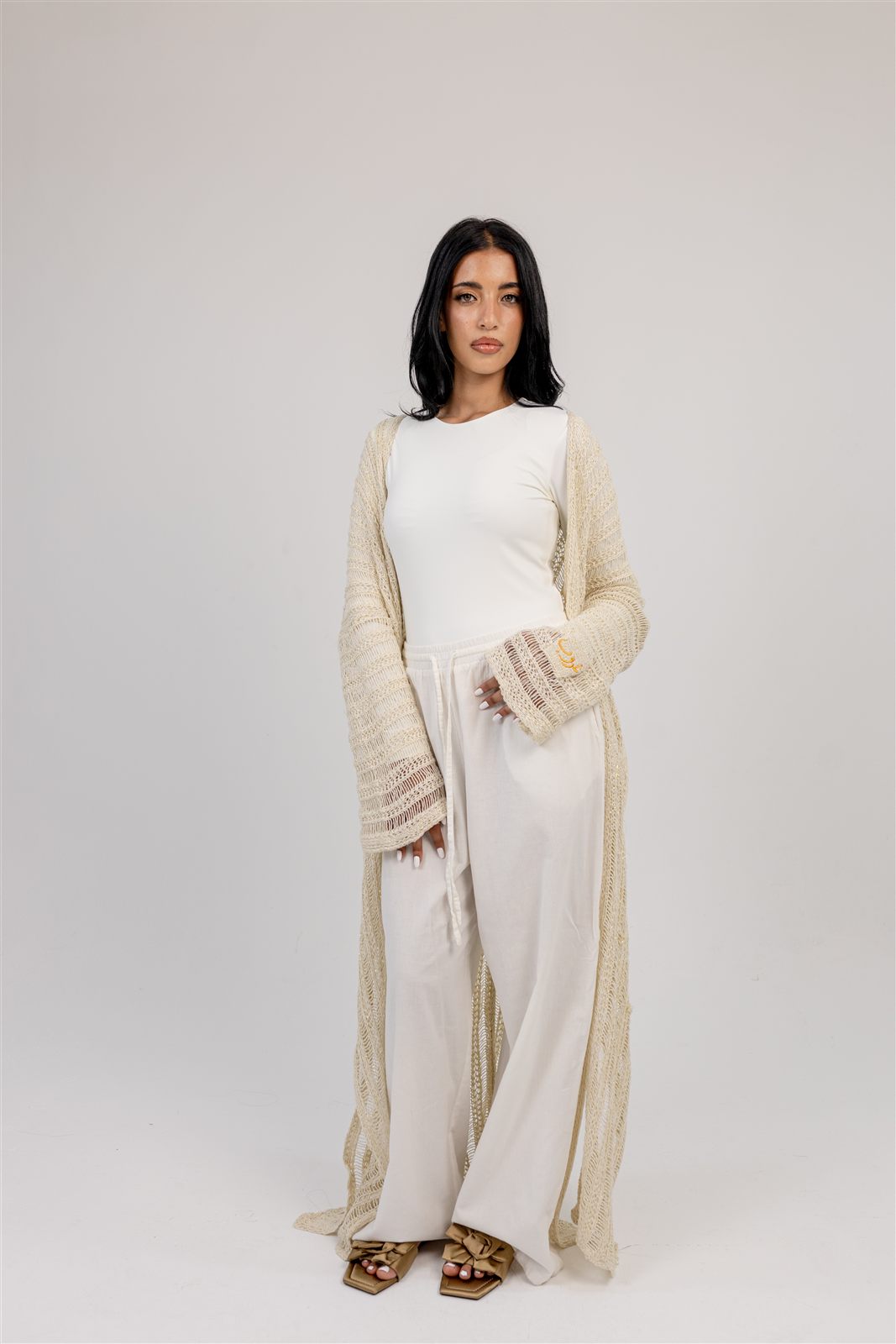 Ghoroub Cardigan worn with relaxed separates.